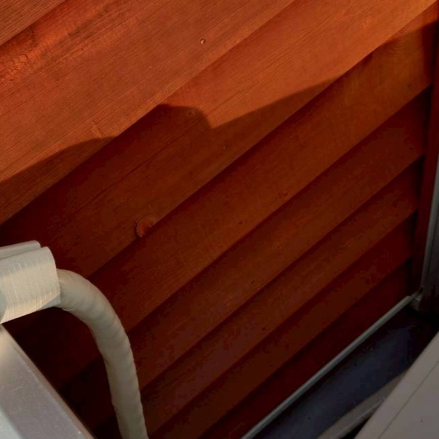 外壁の上塗り後（マホガニ）